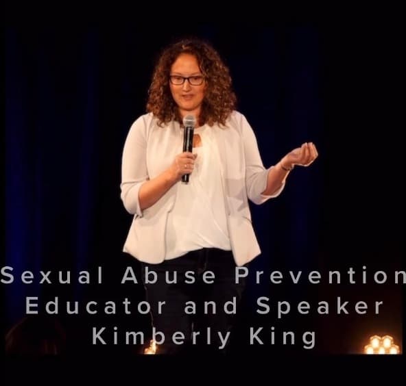 Kimberly King presenting a keynote on stage